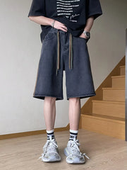 Men's black wide-leg denim shorts with drawstring and side stripe detail