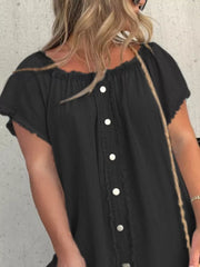 Black off-shoulder denim dress with frayed hem and button front detail.