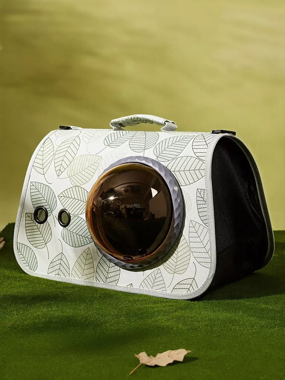 White pet carrier bag with leaf pattern and amber bubble window