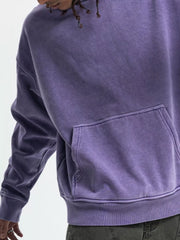Purple vintage pocketed long-sleeve hoodie with a relaxed fit and visible front pocket detail.