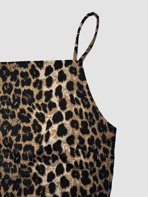 Leopard print cami crop top with spaghetti strap and square neckline.