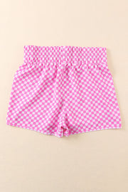 Checkered pink shorts with elastic waistband and scalloped hem