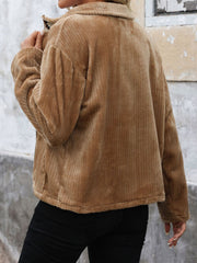 Camel corduroy zip-up jacket with collared neckline and crochet detail.