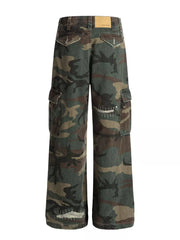 Men's distressed camouflage cargo pants with multiple pockets and raw hem detail.