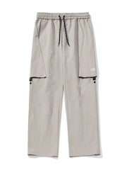 Gray cargo pants with elastic waist, drawstring, and multiple pockets.