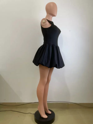 Black mini dress with cutout neckline and bubble hem