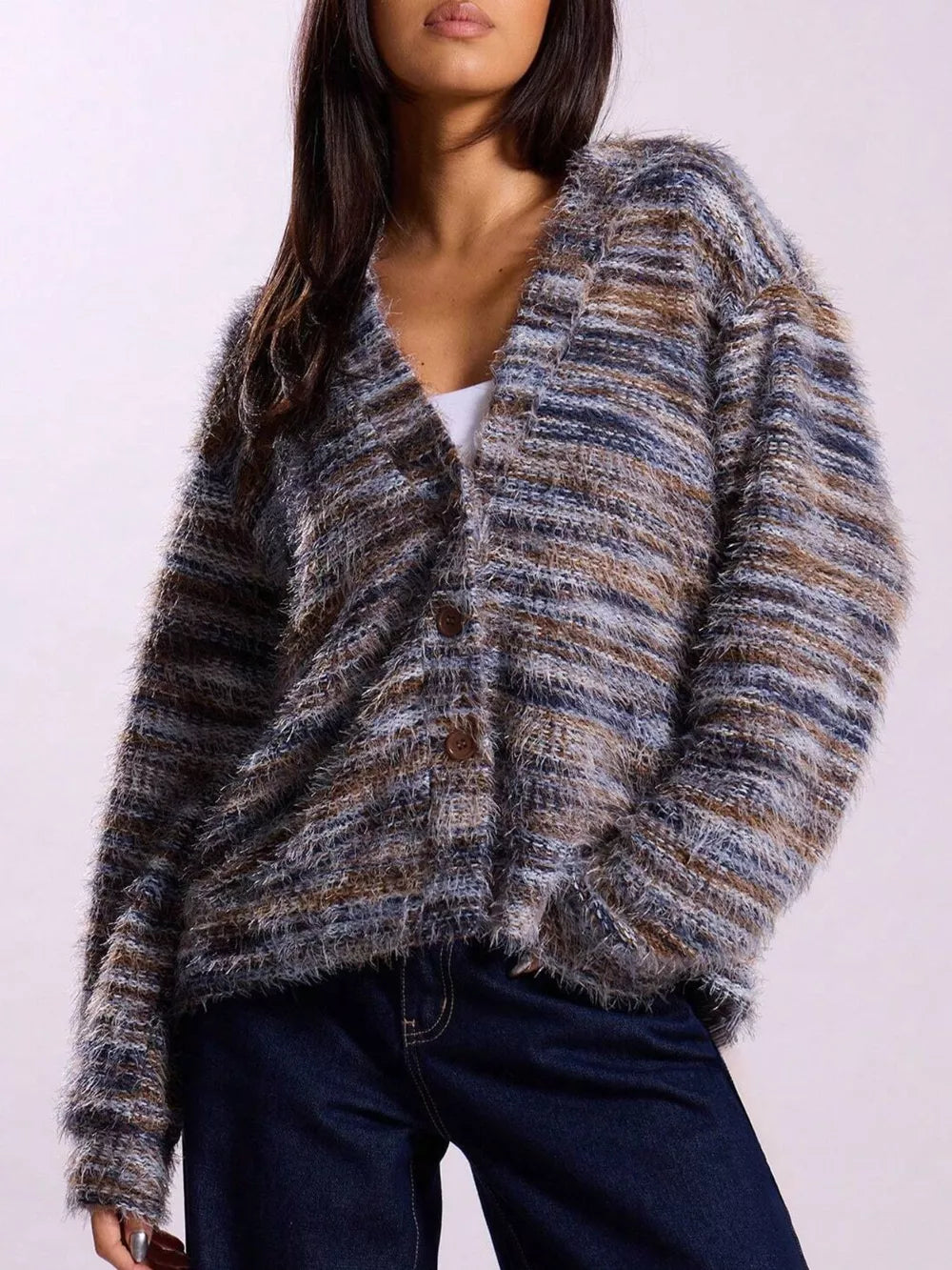 Cozy textured knit cardigan with buttons in a marled brown, blue, and gray stripe pattern.