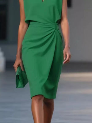 Dark green ruched sheath dress with keyhole neckline and sleeveless design.