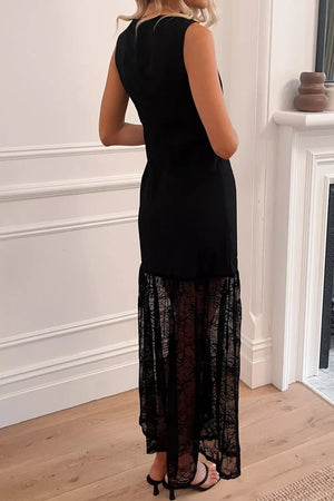Black lace maxi dress with sheer lace hem detail.