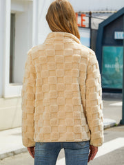 Tan textured grid zip-up jacket with a stand-up collar.