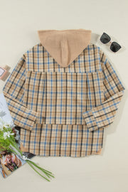 Textured plaid hooded overshirt with raw hem and waffle knit hood.