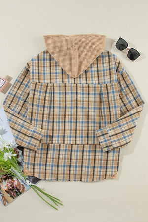 Textured plaid hooded overshirt with raw hem and waffle knit hood.