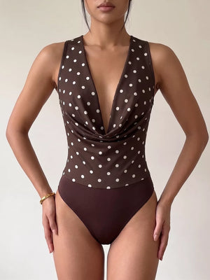 Brown polka dot bodysuit with cowl neck and sleeveless design