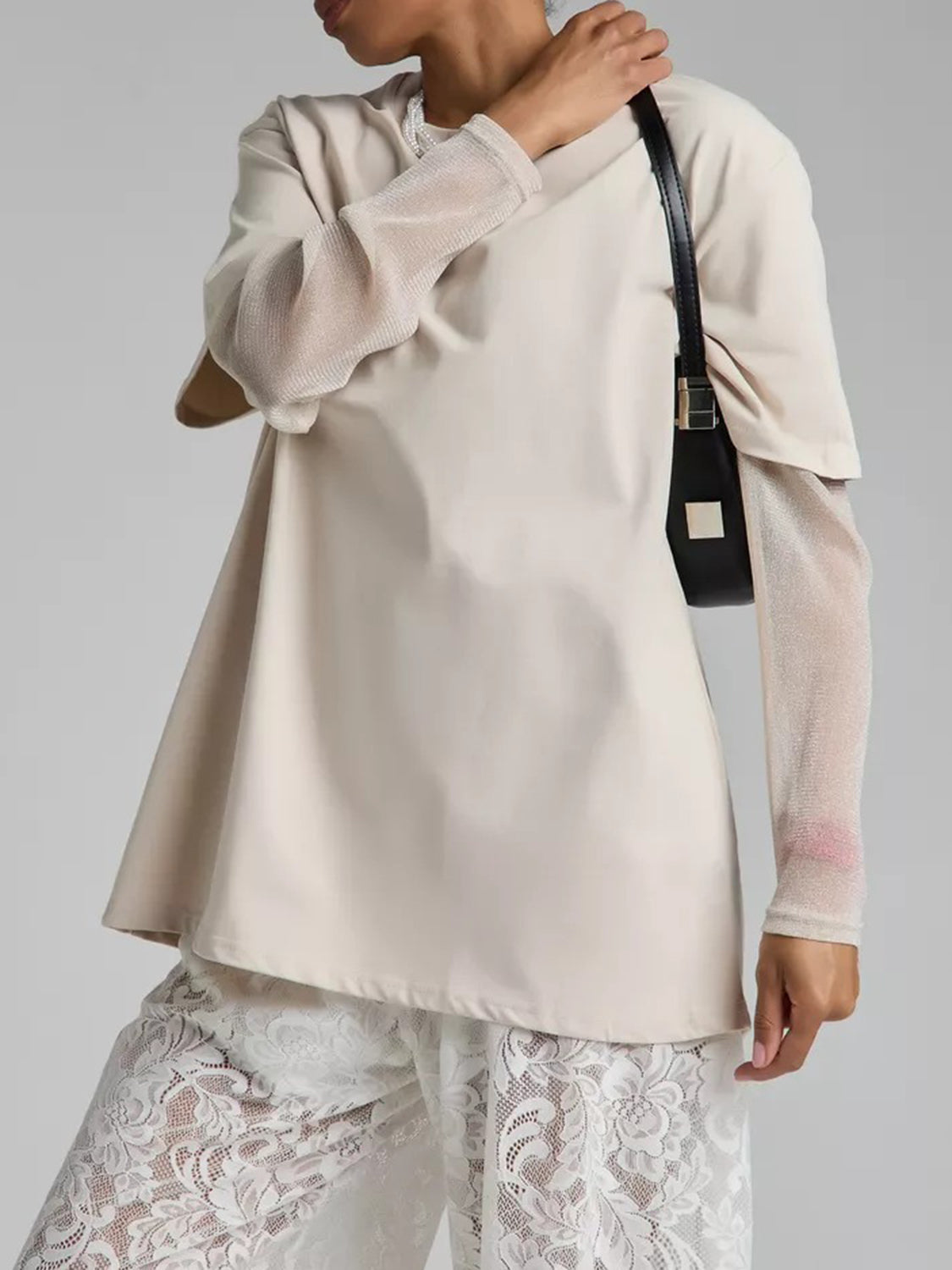 Oversized tee in Camel with sheer, shimmering long sleeves and a relaxed fit.