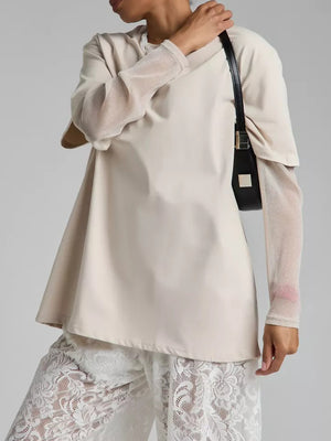 Oversized tee in Camel with sheer, shimmering long sleeves and a relaxed fit.