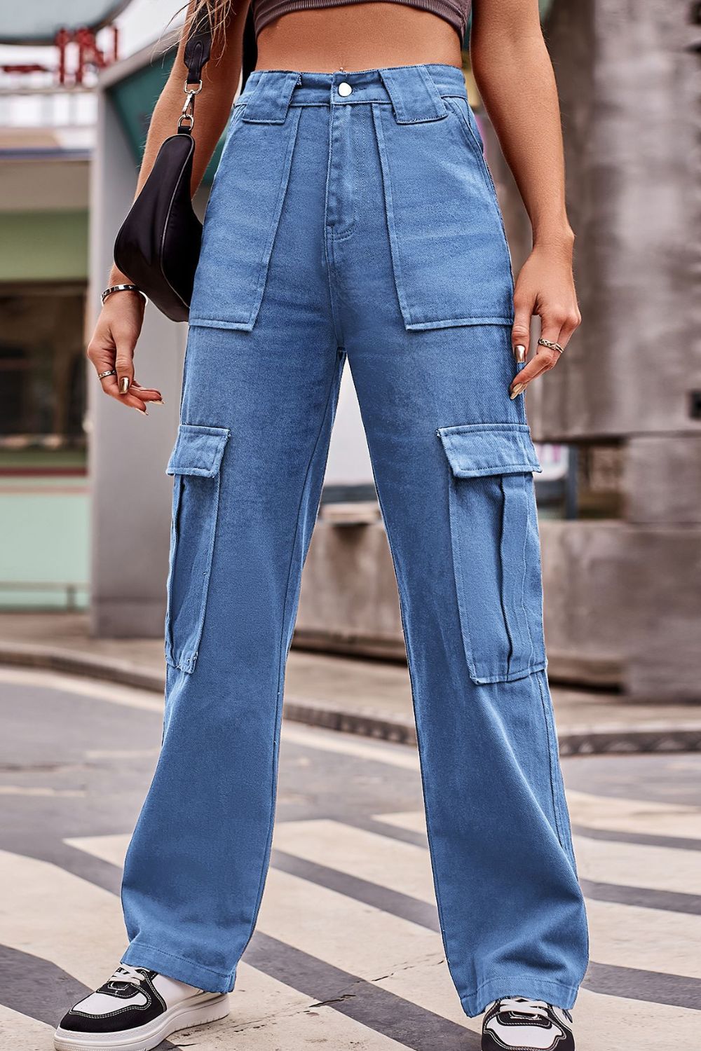 Utility pocket wide leg trousers in Dusty Blue denim with multiple cargo pockets.