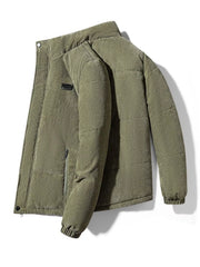 Men's padded corduroy puffer jacket in army green with zip pocket detail.