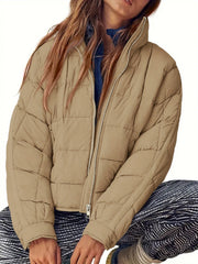 Camel quilted bomber jacket with stand collar and full zip.