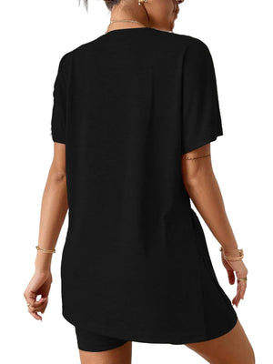 Black tee and shorts set with side slits on the tee.