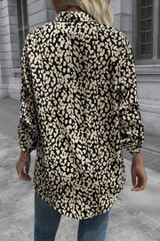 Black and beige abstract spot print oversized shirt with buttoned cuffs.