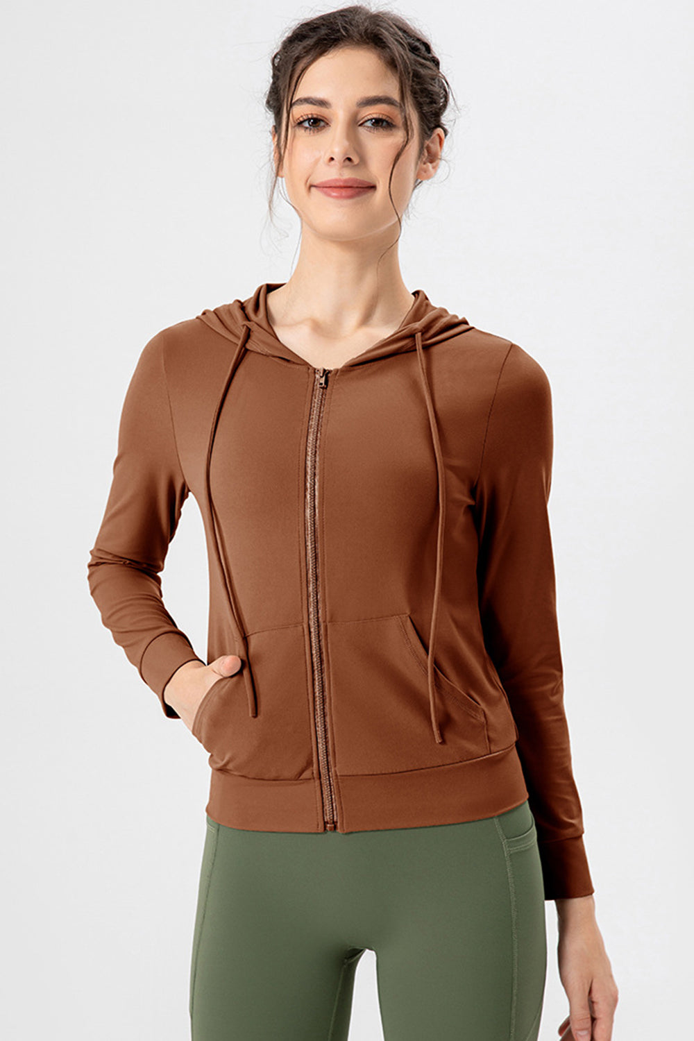 Brown zip-up hoodie with drawstrings and pockets, performance fit
