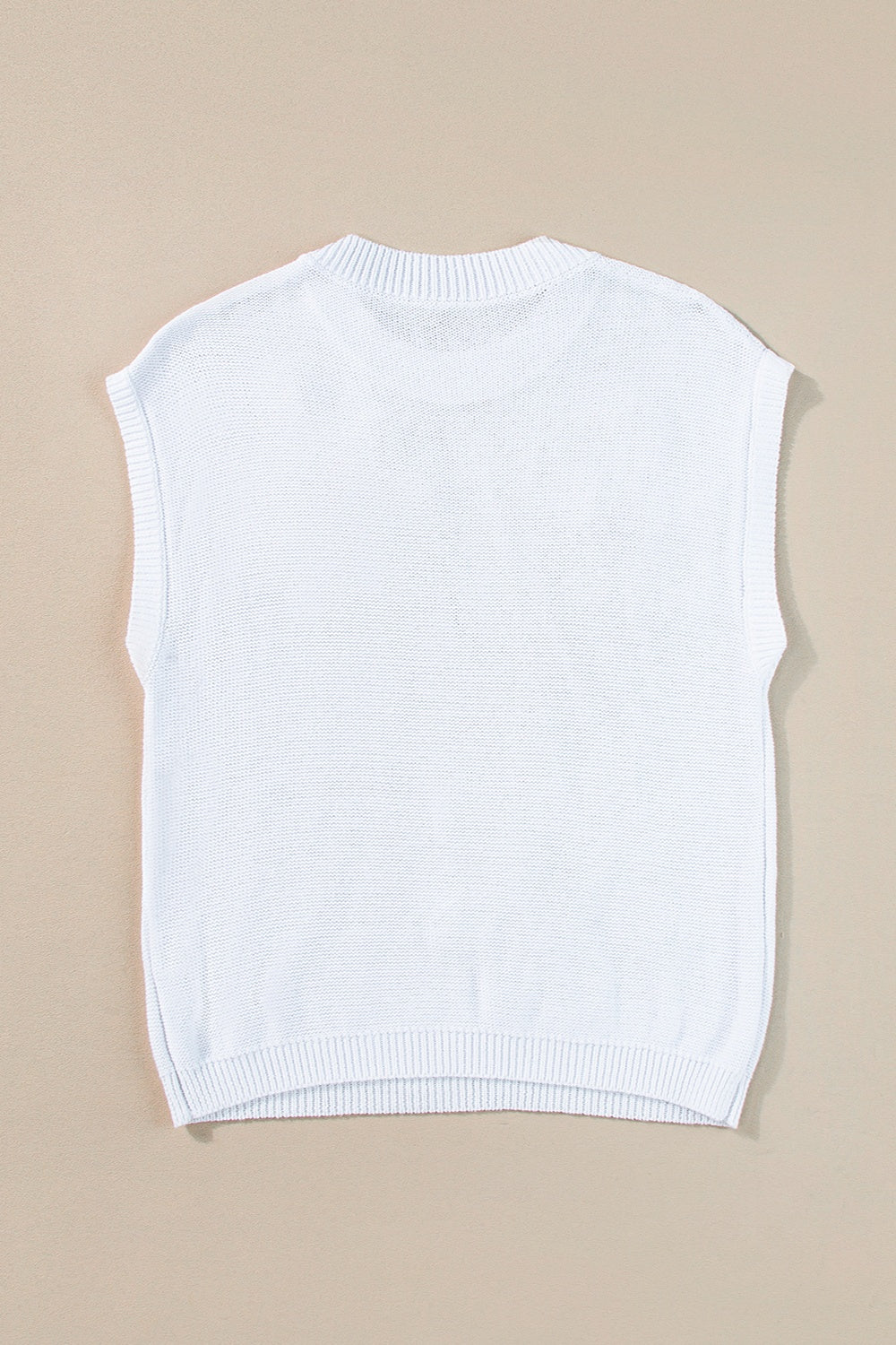 White knit sleeveless top with ribbed neckline and hem