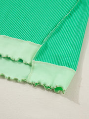 Twist ribbed t-shirt in bright green with contrast stitching and lettuce hem detail.