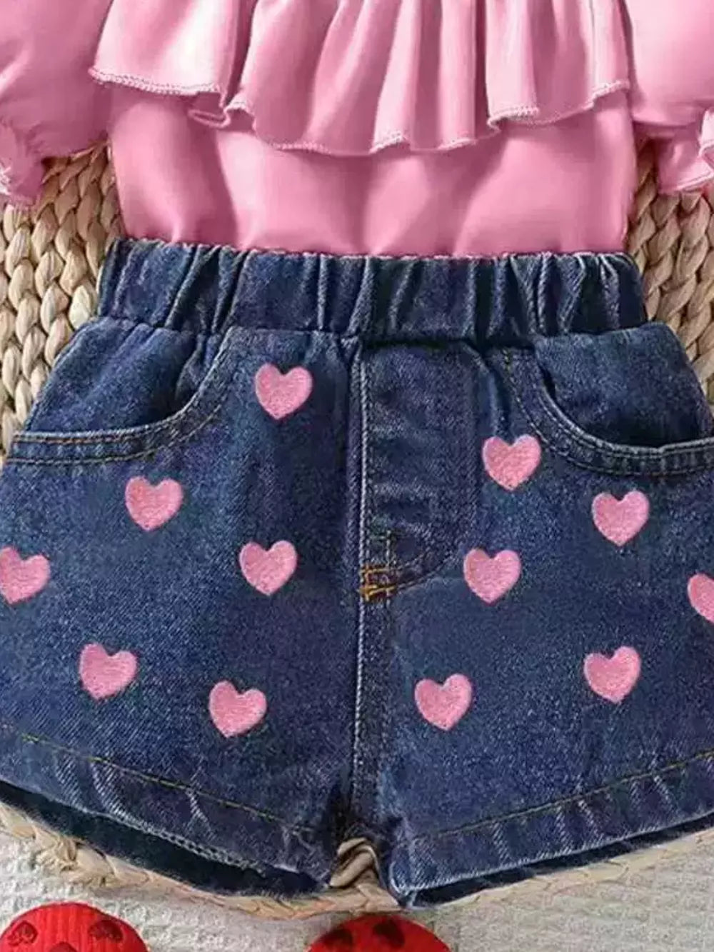 Pink ruffled top and denim shorts set with pink hearts for baby girls