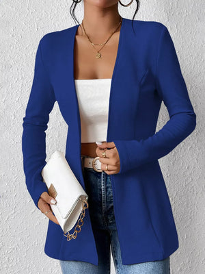 Blue single-button blazer with tailored fit and open front, worn with a white top and jeans.