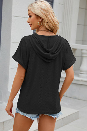 Black perforated henley hooded tee with short sleeves and cuffed hems