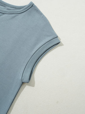 Cap sleeve t-shirt dress in French blue cotton with ribbed cuffs.