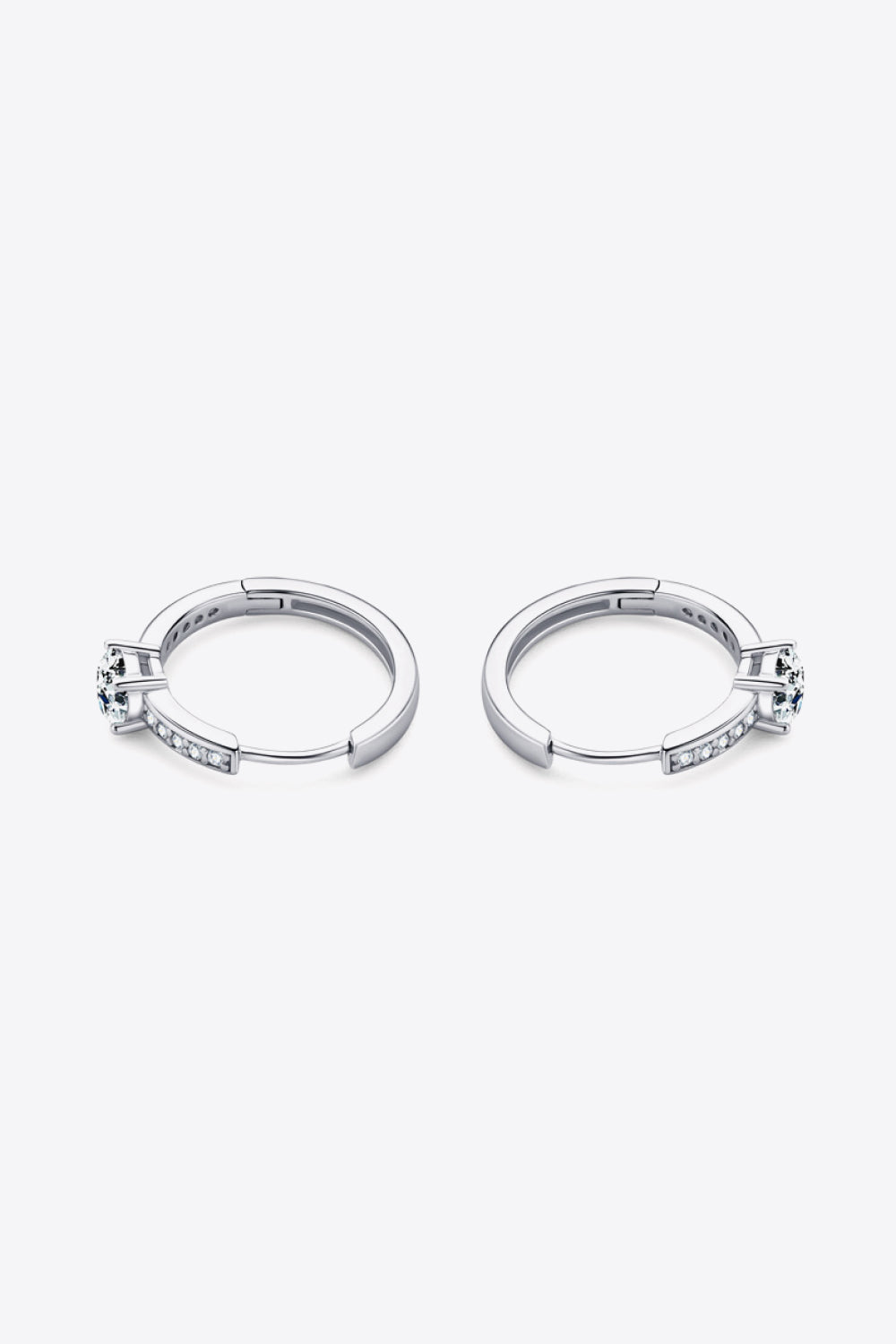 Silver pavé halo moissanite hoop earrings with a central stone