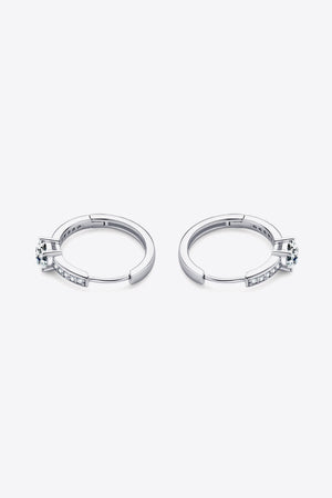 Silver pavé halo moissanite hoop earrings with a central stone