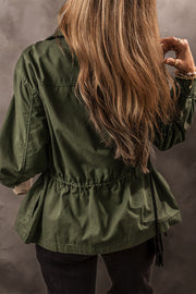Army green casual jacket with drawstring waist and utility details.