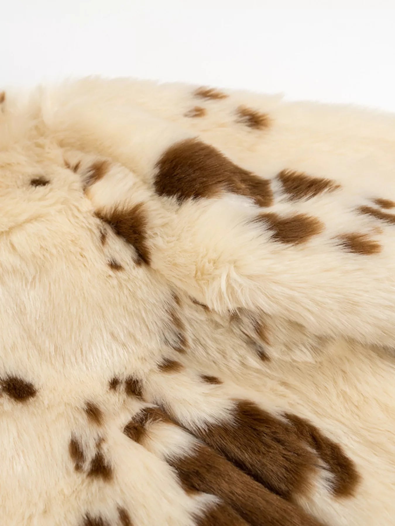 Beige faux fur cropped jacket with brown spots