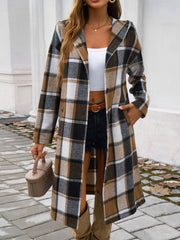 Checked plaid hooded duster coat in brown, white, black, and gray.