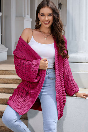 Hot Pink textured knit cocoon cardigan with balloon sleeves and open front.