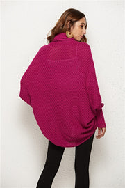 Cocoon knit cardigan in deep purple with shawl collar and batwing sleeves.