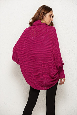 Cocoon knit cardigan in deep purple with shawl collar and batwing sleeves.