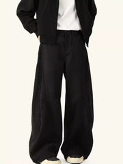 Black relaxed fit sweatpants with contrast side panels and a wide leg