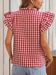 Gingham ruffle sleeve blouse in red and white with a mock neck.