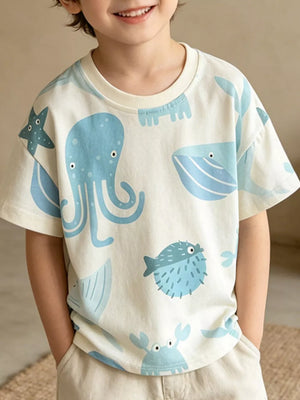 Cream cotton t-shirt with playful blue ocean creatures graphic print.