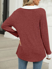 Ribbed knit long sleeve t-shirt in Rust Red with white collar and cuffs.