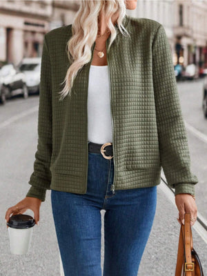 Army green quilted bomber jacket with zip closure and pockets.