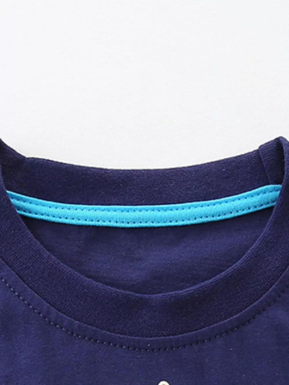 Boys' dark navy cotton t-shirt with blue trim detail at the neckline.
