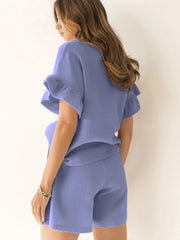 Blue purple textured gauze co-ord set with ruffle sleeves and shorts.