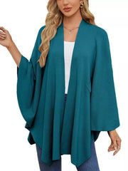 French blue knit cape top with draped elegance and wide sleeves