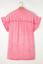 Acid wash ruffle shirt dress in dusty pink with elasticated waist and short sleeves.