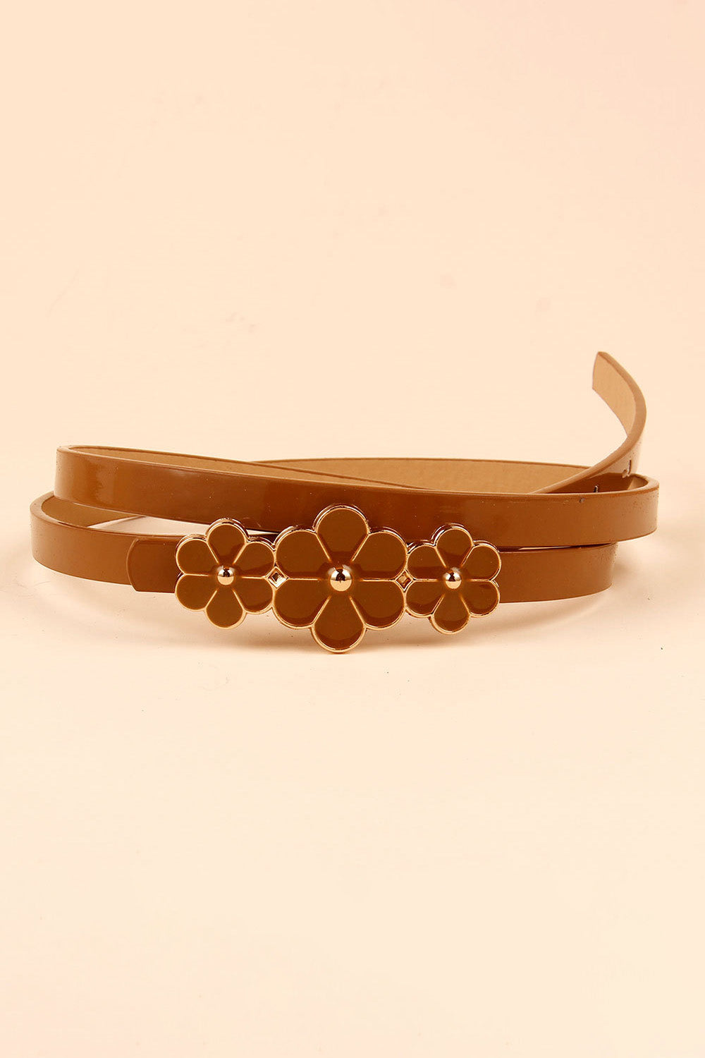 Caramel skinny belt with three floral blossom charms and gold accents.