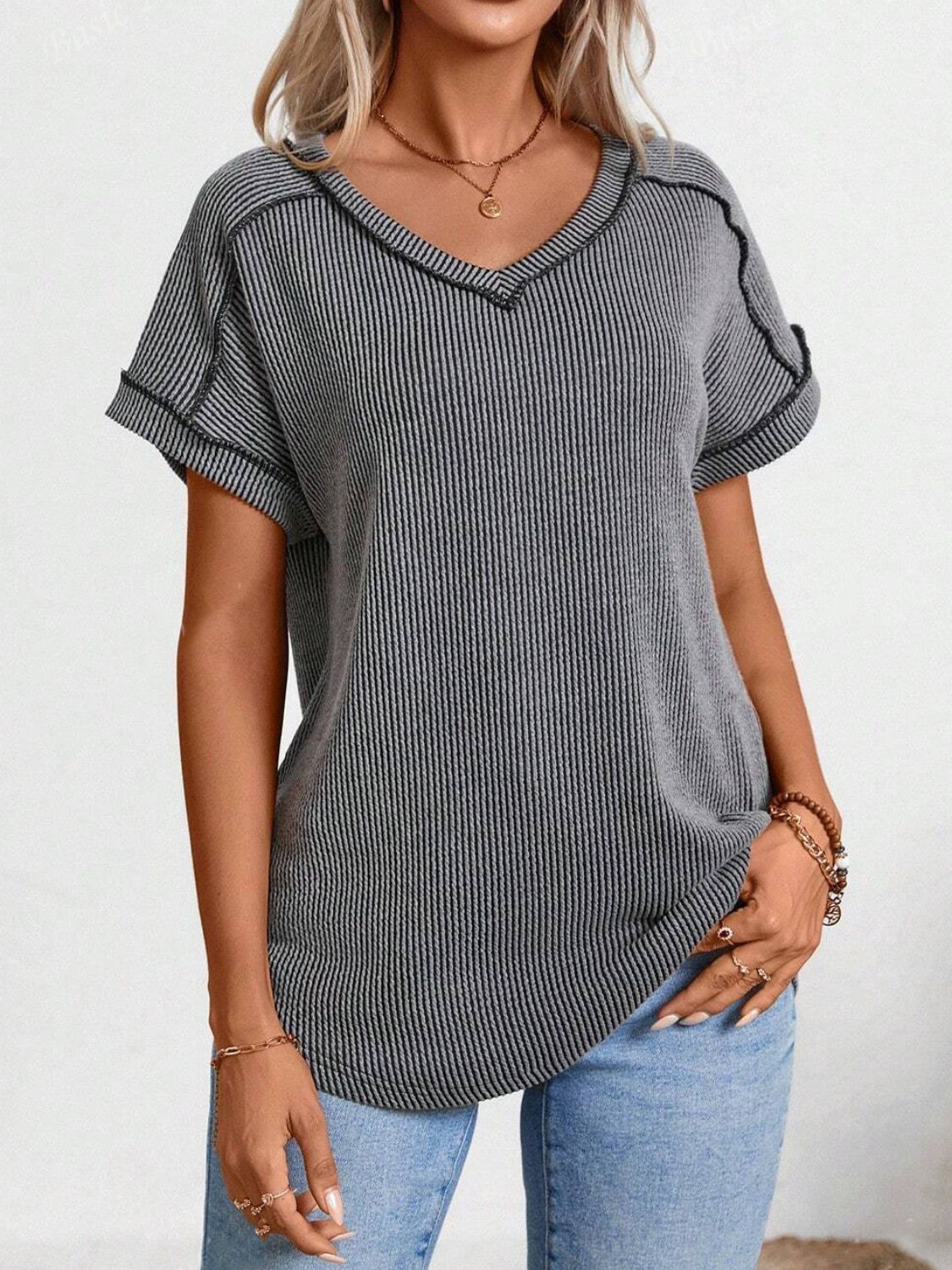 Dark Gray ribbed V-neck t-shirt with contrast stitching and short sleeves.